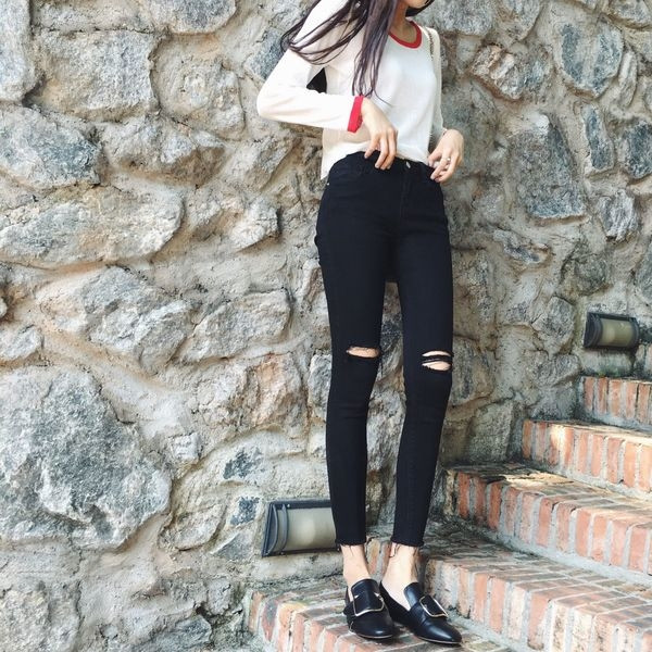 Pantaloni de damă cu talie înaltă cu elemente rupte