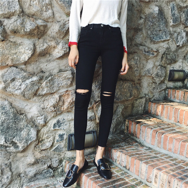 Pantaloni de damă cu talie înaltă cu elemente rupte