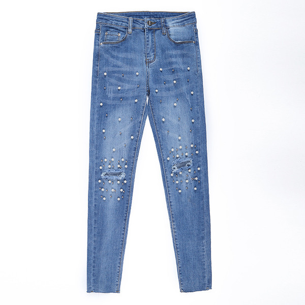 Актуални дамски дънки с декоративни перли в светъл цвят