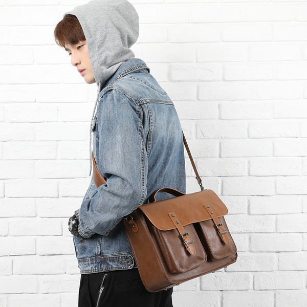 Geanta pentru barbati cu buzunare exterioare si curea lunga de umar