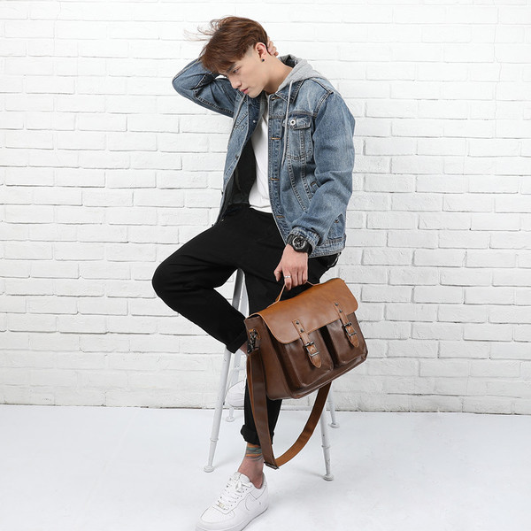 Geanta pentru barbati cu buzunare exterioare si curea lunga de umar