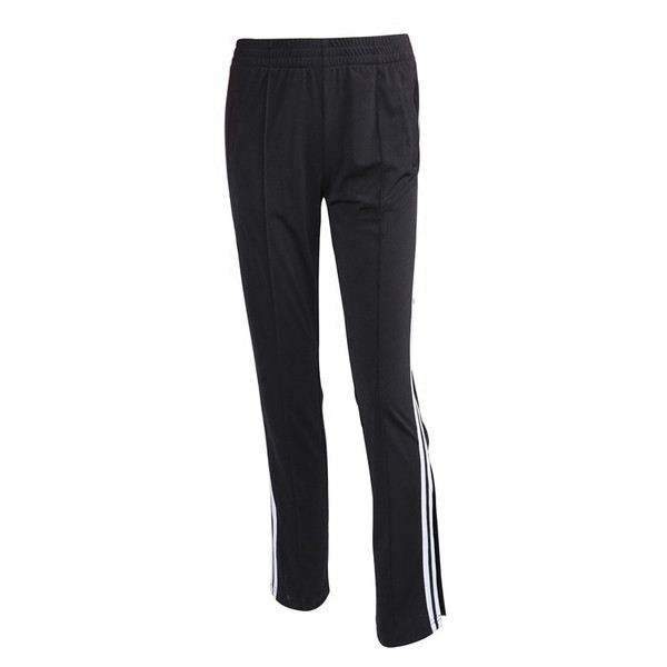 Модерен спортен дамски панталон в черен цвят с кант