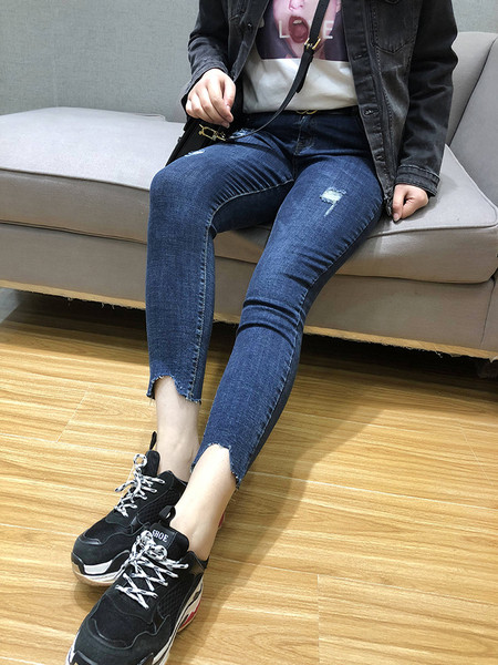 Стилни дамски накъсани дънки с дължина 9/10 - големи размери