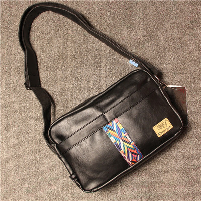 Стилна мъжка чанта от еко кожа с дълга дръжка и с цветен кант,подходяща за ежедневие