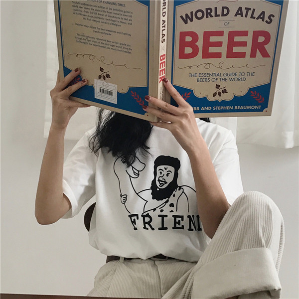 Bluză casual de damă cu mâneci largi 3/4 cu aplicație în alb și negru