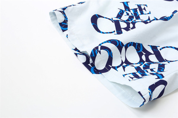 Pantaloni scurți pentru bărbați în alb cu inscripție colorată