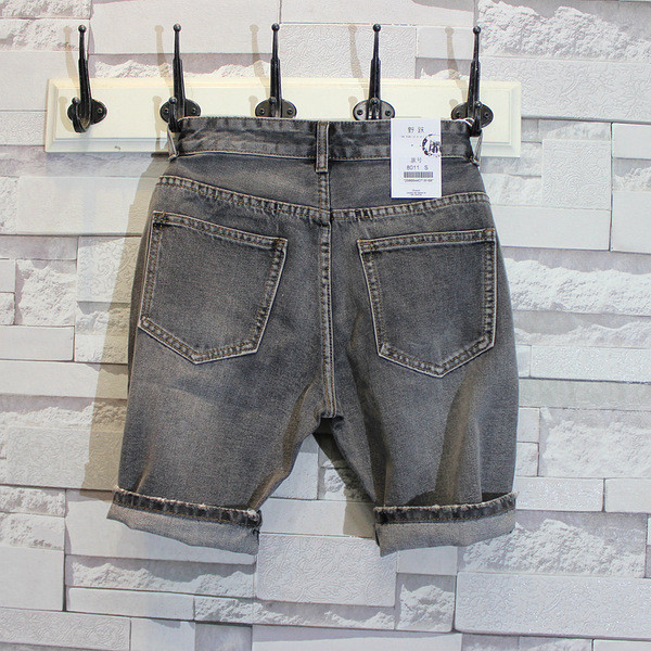 Rövid férfi farmer, sötét zsebekkel