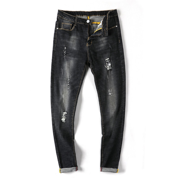 Sötét színben szakadt alkalmi férfi farmernadrág