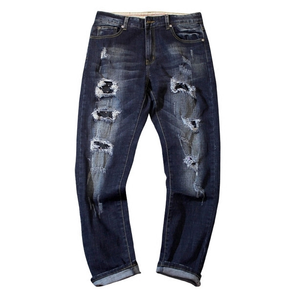 Stílusos férfi farmer, sötét színű foltokkal