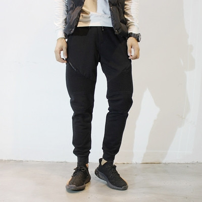 Men`s sports pants with zipper decoration and buttons in black