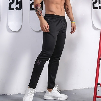 Мъжки спортни еластични панталони в черен цвят с джобове