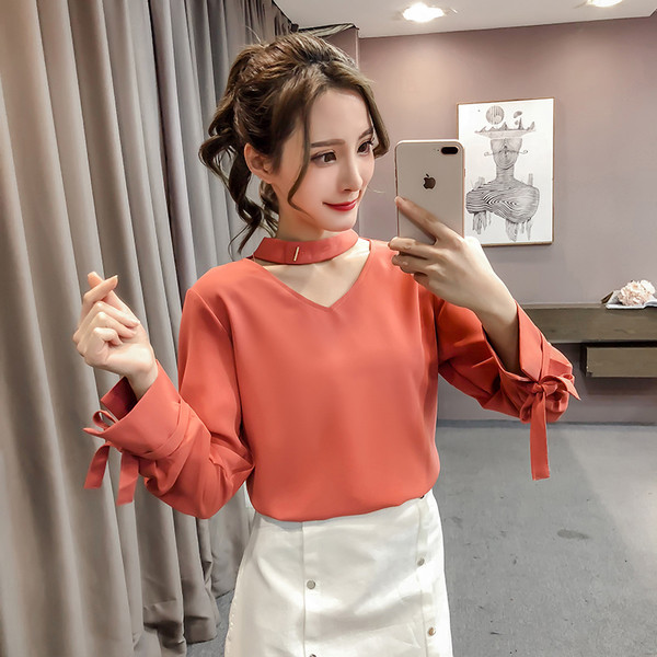 Stílusos női ing V-nyakkal és szalagokkal