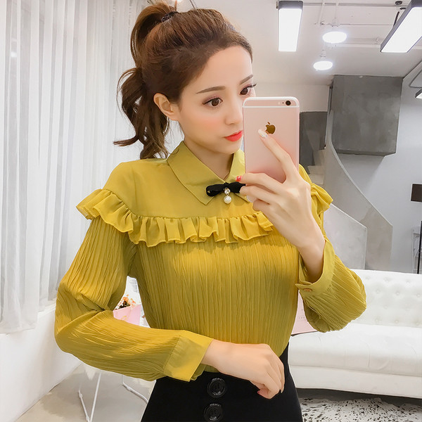 Stílusos női rakott ing díszítéssel