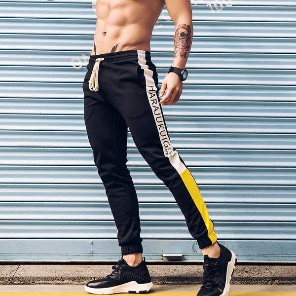 Ανδρική αθλητική φόρμα σε τρία χρώματα με κορδόνια και χρωματιστές άκρες