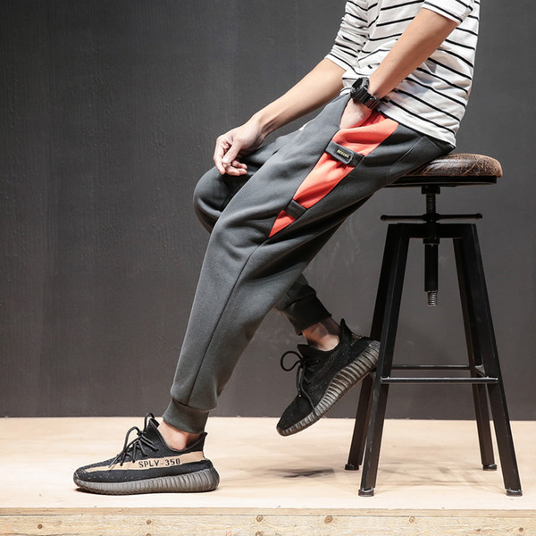 Férfi sportnadrág két színben, színes szalagokkal