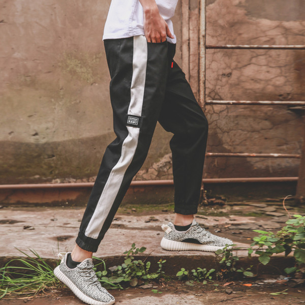 Ανδρικά παντελόνια με τσέπες, κορδόνια και χρωματιστές άκρες