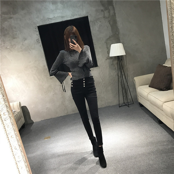 Sportos és elegáns női nadrág magas derékkal és dekoratív gombokkal, három színben