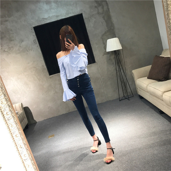 Sportos és elegáns női nadrág magas derékkal és dekoratív gombokkal, három színben