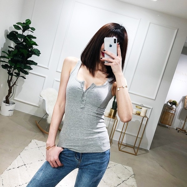 Női sport-alkalmi felső állítható V-nyakkal, több színben