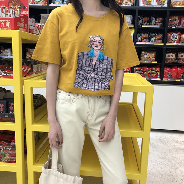 Női sportpóló O-alakú gallérral és színes rátéttel szabad fazonban több színben