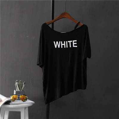 Καθημερινή γυναικεία μπλούζα  με πτώση ώμου και ασύμμετρο μήκος