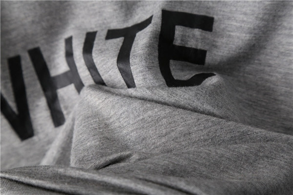 Καθημερινή γυναικεία μπλούζα  με πτώση ώμου και ασύμμετρο μήκος