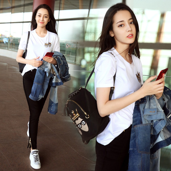 Alkalmi női póló rövid ujjal, fehér színben, mintával