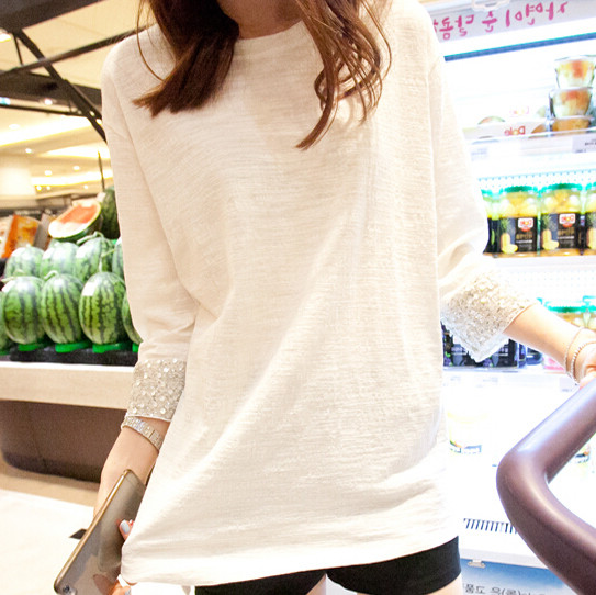 Γυναικεία κομψή λευκή μπλούζα με χάντρες