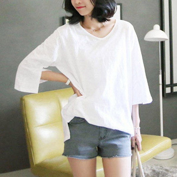 Női alkalmi blúz 3/4-es ujjal és V-nyakú fehér színben