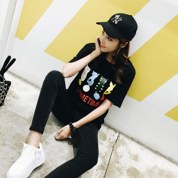 Alkalmi női blúz 3/4 ujjal, rátéttel - fehér és fekete