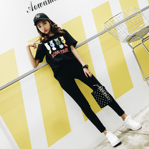 Alkalmi női blúz 3/4 ujjal, rátéttel - fehér és fekete