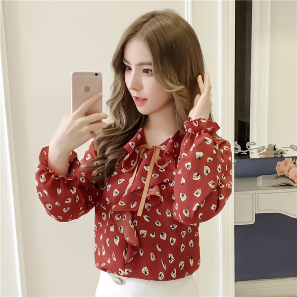 Modern női ing fodrokkal és szalaggal