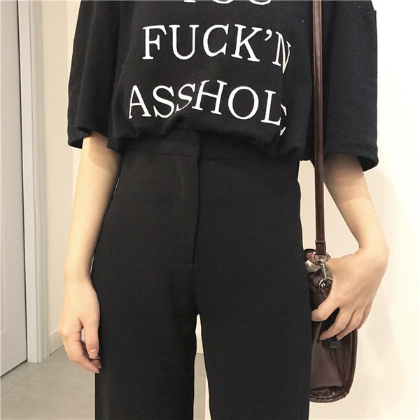 Stílusos női nadrág magas derékkal, széles modell fekete színben