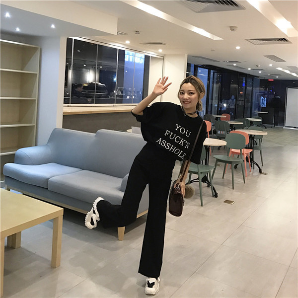 Stílusos női nadrág magas derékkal, széles modell fekete színben