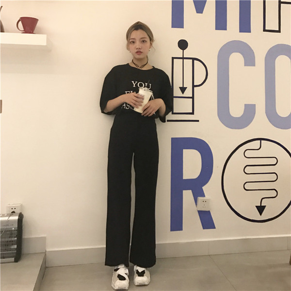 Stílusos női nadrág magas derékkal, széles modell fekete színben