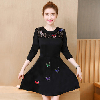 Γυναικείο φόρεμα σε μαύρο χρώμα με δαντέλα και κεντήματα