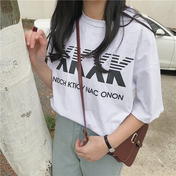 Περιστασιακή γυναικεία μπλούζα με μανίκι 3/4 σε λευκό και μαύρο χρώμα