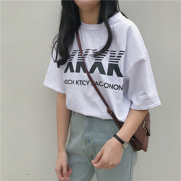 Περιστασιακή γυναικεία μπλούζα με μανίκι 3/4 σε λευκό και μαύρο χρώμα