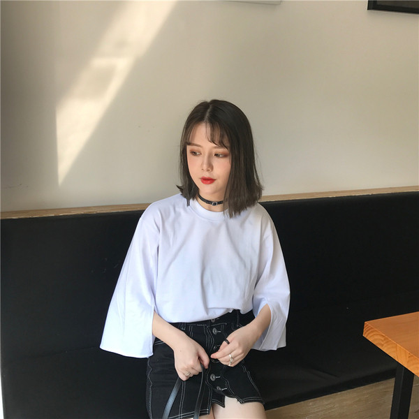 Κομψή casual γυναικεία μπλούζα με 3/4 μανίκι σε λευκό και μαύρο χρώμα