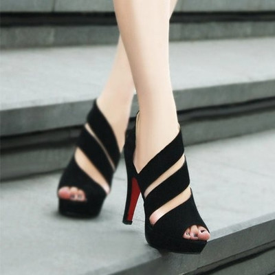 Stylish women`s high-heeled sandals in black