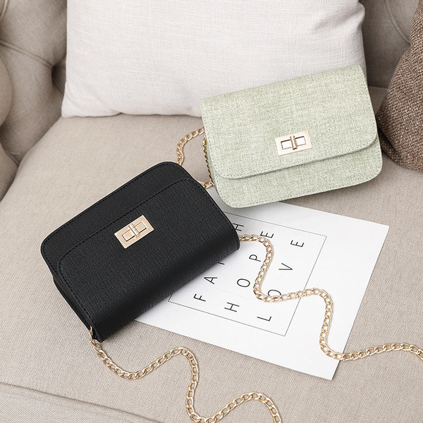 Geanta de dama moderna cu inchizatoare metalica cu maner lung metalic in trei culori