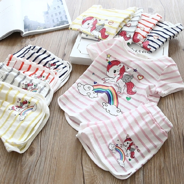 Ριγέ παιδικό σετ για κορίτσια από μπλούζα και παντελόνι με εφαρμογή