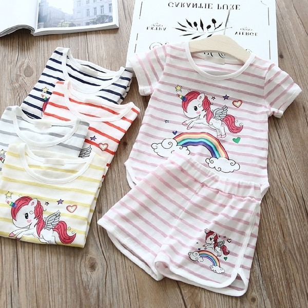 Ριγέ παιδικό σετ για κορίτσια από μπλούζα και παντελόνι με εφαρμογή