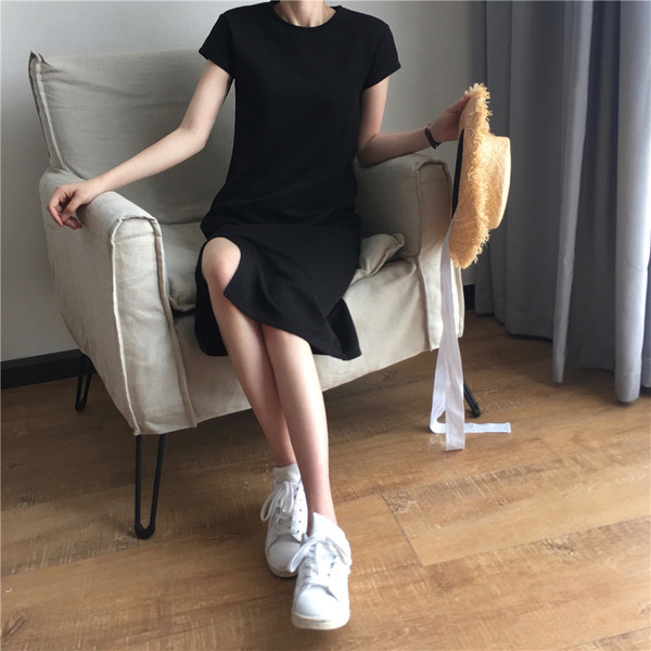 Γυναικείο αθλητικό-καθημερινό φόρμα με κολάρο σε σχήμα O και σχισμή σε μαύρο χρώμα