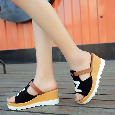 Women`s casual slippers in several colors on a platform with a wide strap