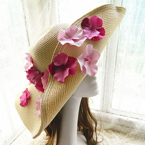 Női strandkalap virágos motívumokkal