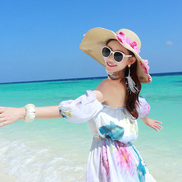 Női strandkalap virágos motívumokkal