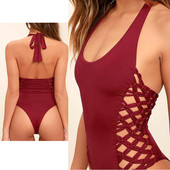 Un costum de baie intreg de dama in doua culori cu bretele transversale laterale