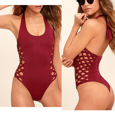 Un costum de baie intreg de dama in doua culori cu bretele transversale laterale