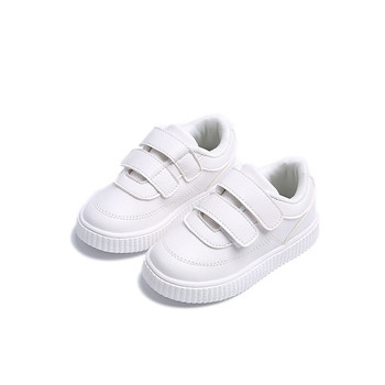 Απλά παιδικά πάνινα παπούτσια unisex κατάλληλα για τη καθημερινή ζωή με λουράκια βελκρό και επίπεδες σόλες σε μαύρο, λευκό και ρ